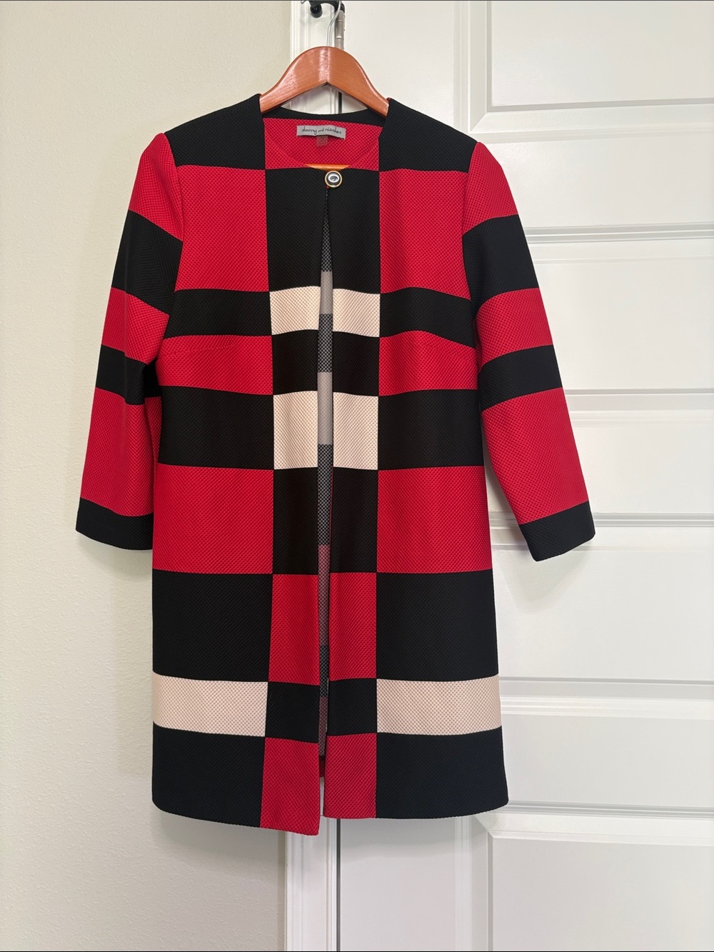 Danny & Nicole Black Coat with Red Trim and Gold Accent